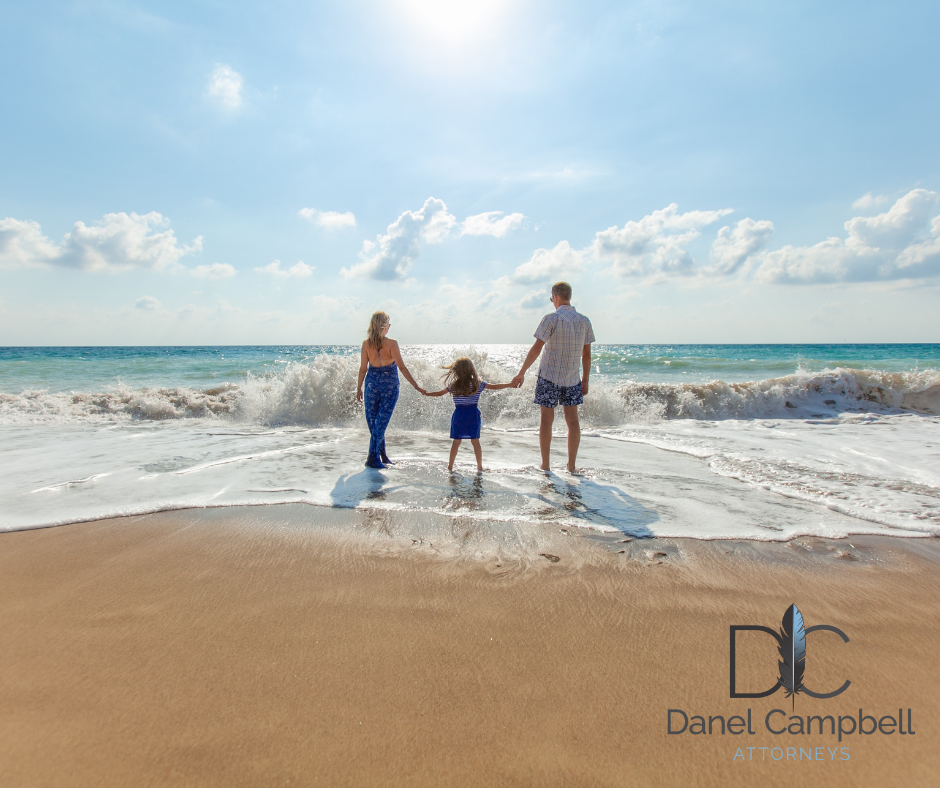 Parents holding child’s hands symbolising the role of the Family Advocate in South Africa.